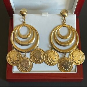 Elegant gold tone faux coin earrings.